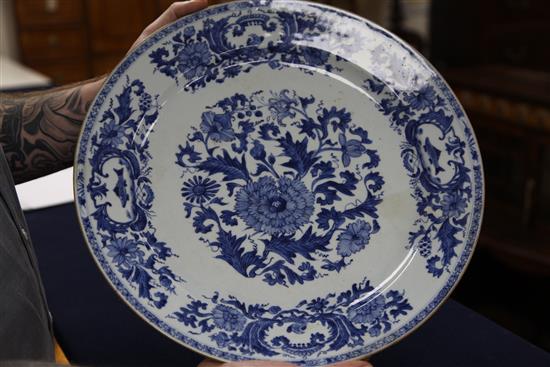 A Chinese export blue and white circular dish, Kangxi / Yongzheng period, 41cm, restorations